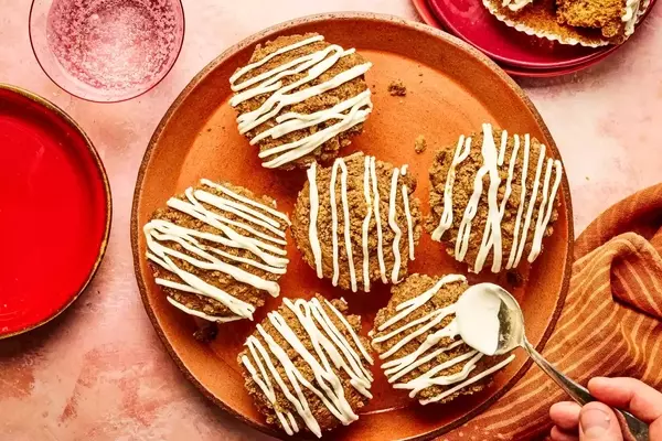 Delectable Gingerbread Muffins with Streusel Topping and Cream Cheese Glaze