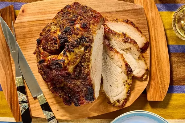 Mastering the Art of Slow-Roasted Fresh Ham with Maple-Bourbon Glaze