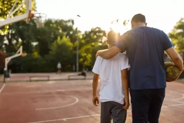 The Influence of Partners on a Father's Engagement with His Children Post-Divorce