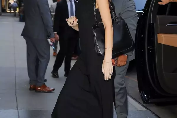 Dakota Johnson's Unexpected Summer Footwear Choice: The Wedge Flip-Flop